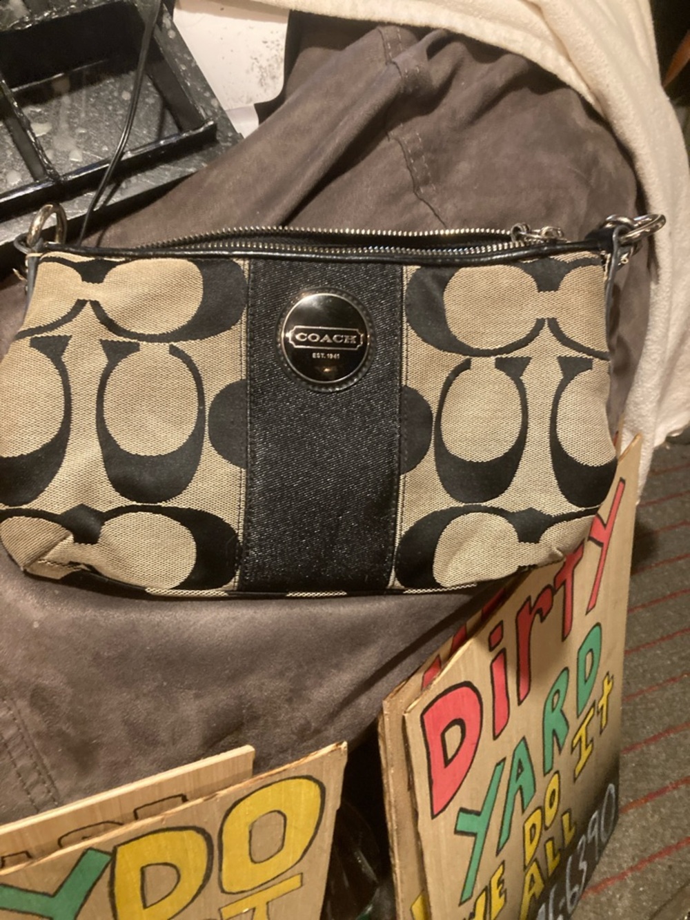 COACH Black and Beige Signature Canvas Wristlet
